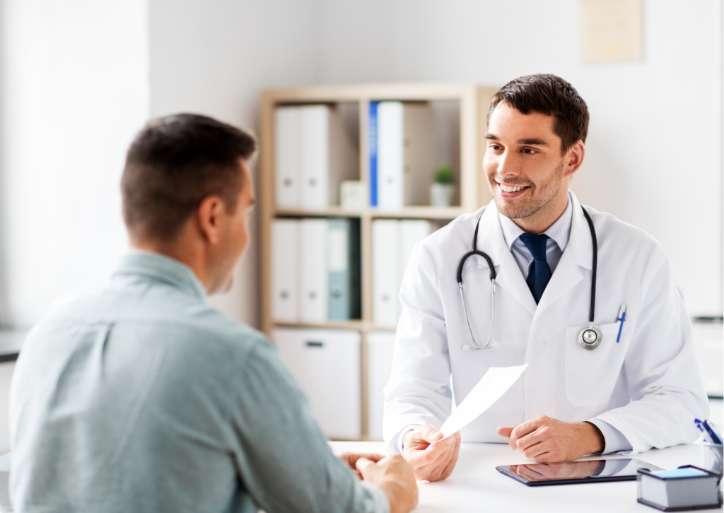 image shows a doctor talking to a patient possibly making a rehabilitation referral