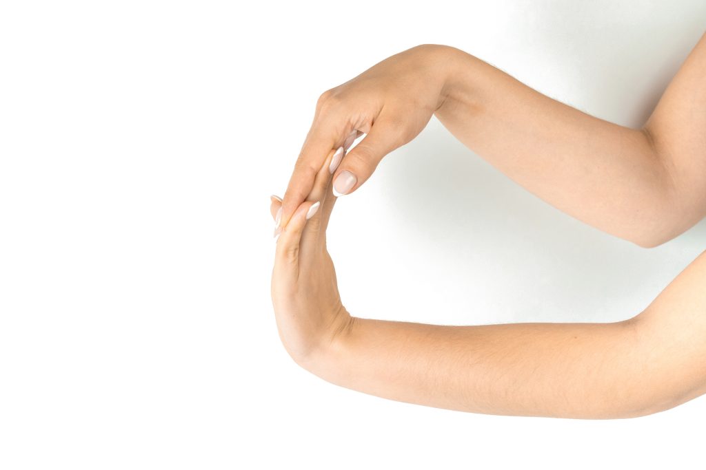 image shows how to perform wrist extension exercise