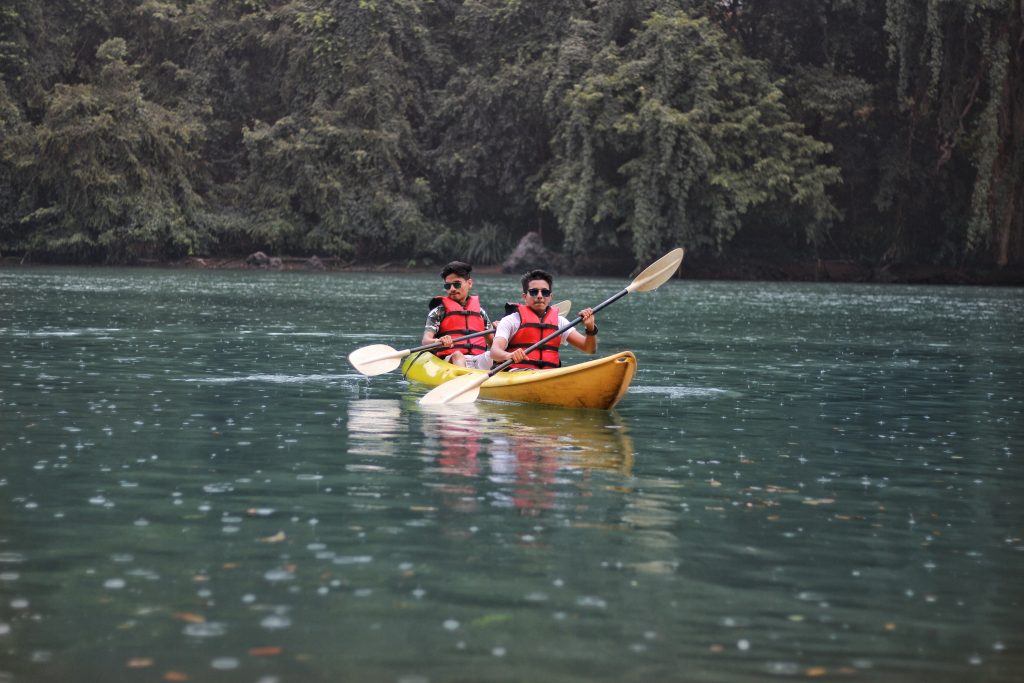 Two boys going kayaking.