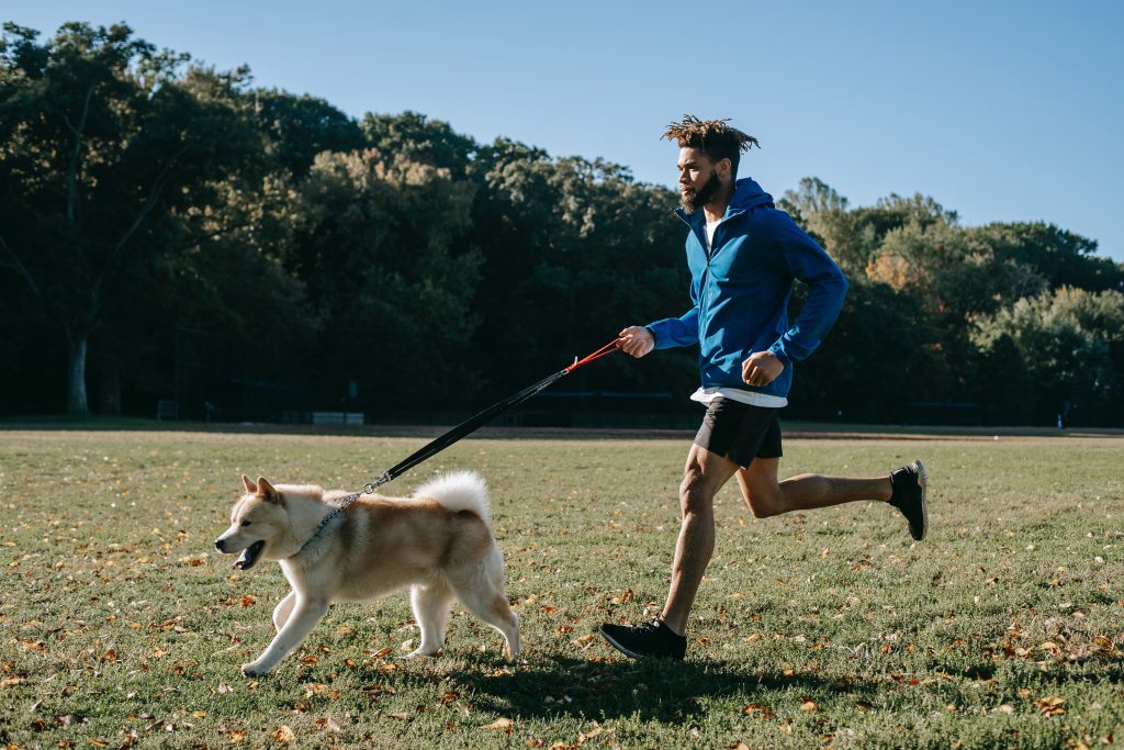 Man walking his dog.