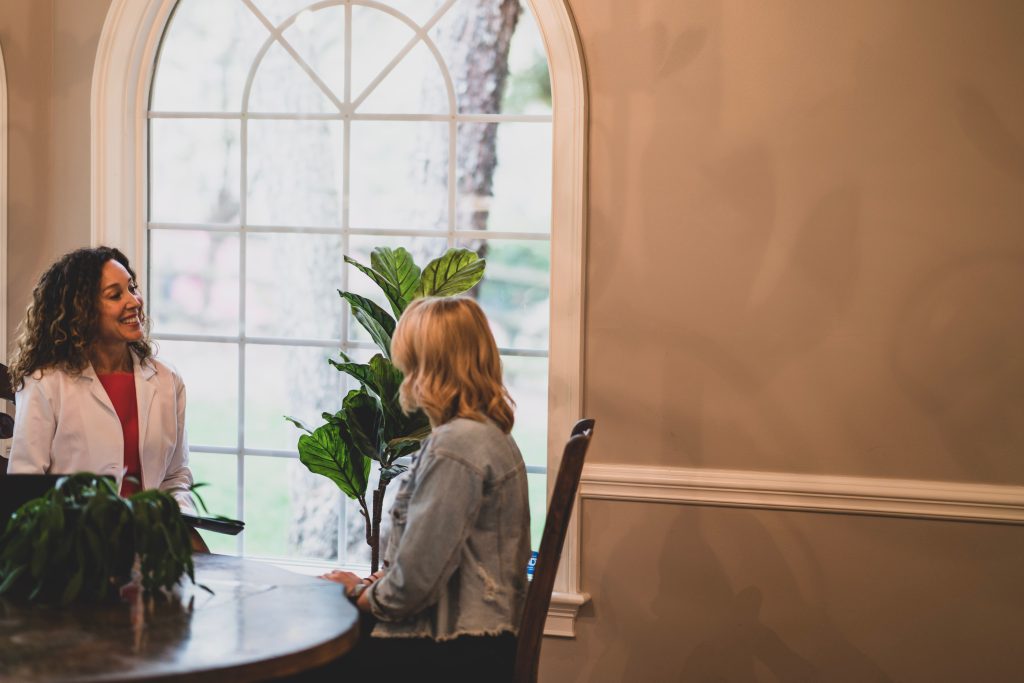 a physiotherapist meeting a potential patient