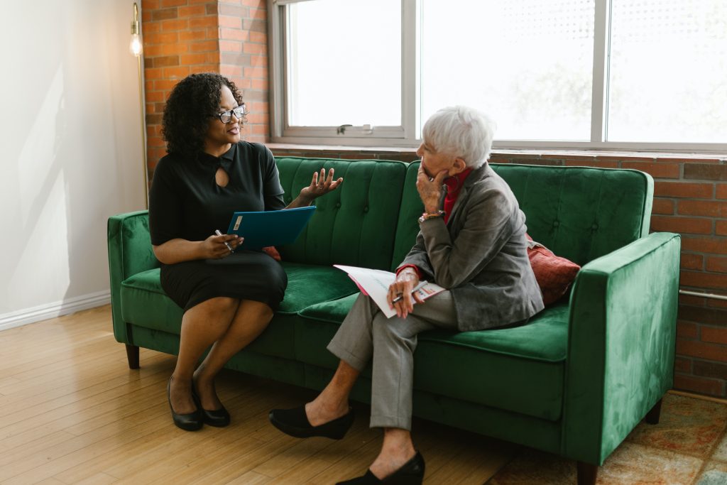 Image of two professionals talking to each other