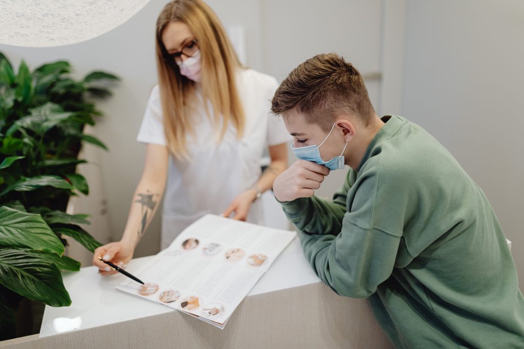 Two medical colleagues going over a catalogue