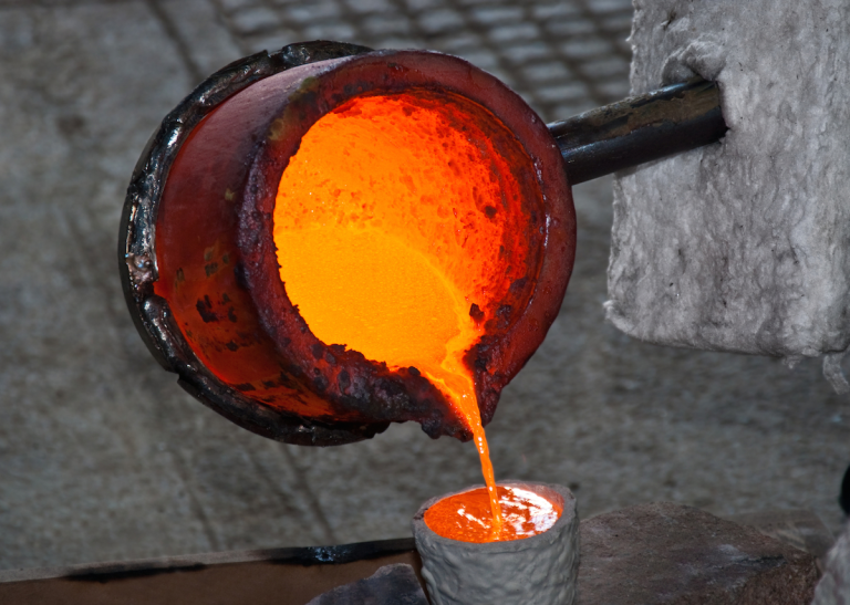 Molten metal is poured into a cast that was once made with paraffin wax 