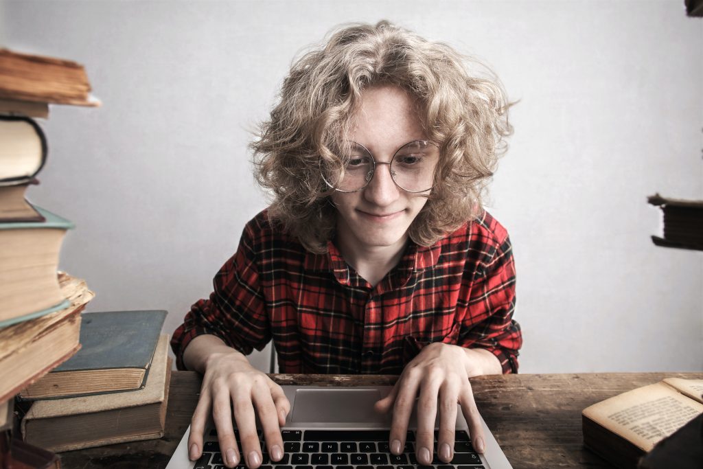 A physiotherapist sitting down and applying for the DOH exam