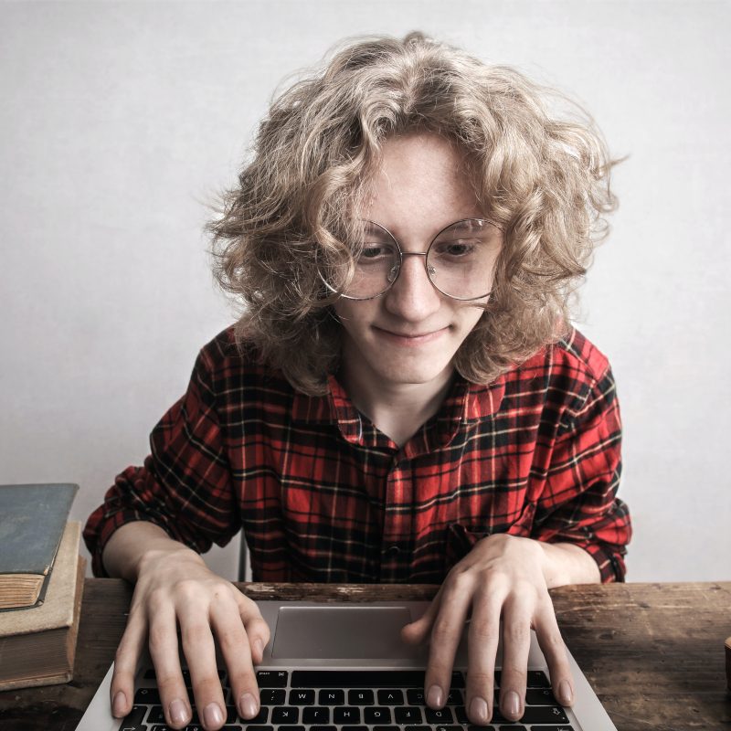 A physiotherapist sitting down and applying for the DOH exam