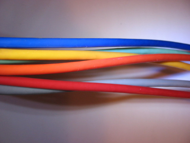 A group of colorful paraffin wax-protected wiring