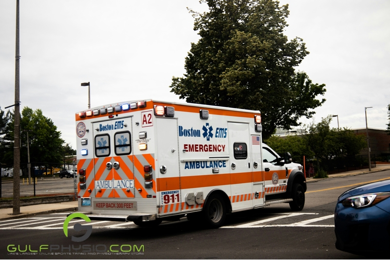 An ambulance parked on a street.